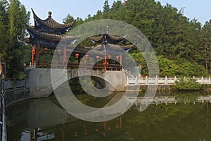 Covered bridge with reflection at enshi, China