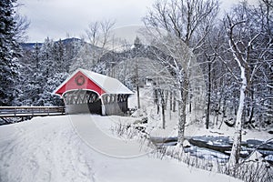 Covered bridge snowfall in rural New Hampshire