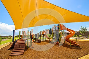 Covered Children\'s Playground Equipment In Public Park