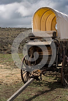 Covered chuckwagon buckboard closeup on seat and tongue