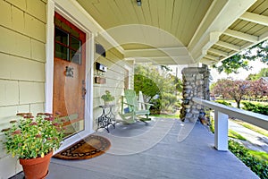 Covered front porch. craftsman style home. photo
