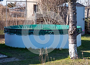 Covered garden pool in winter