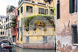 Covered gondolas on on a venetian Canal, Venice, Italy