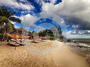 Covered Lounges on Peaceful Tulum Beach