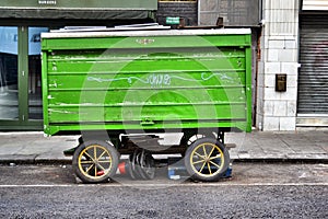 Covered market stall on wheels.