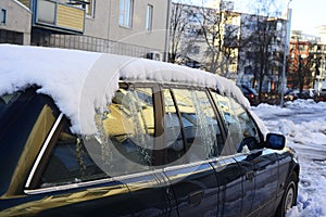 Covered with snow and ice car