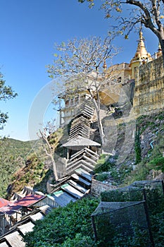 The covered stairway to the Taung Kalat monastery. Mount Popa. Mandalay region. Myanmar