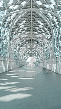 covered walkway bridge It is a tall arch. The design is modern.