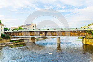 Covered wooden bridge in the town of Lovech in Bulgaria over the Osam river...IMAGE
