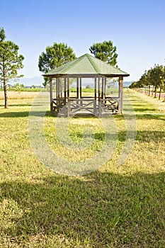 Covered wooden gazebos in a italian countyside