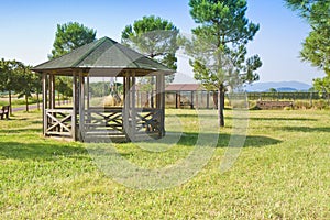 Covered wooden gazebos in a italian countyside Tuscany - Italy