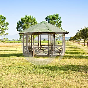 Covered wooden gazebos in a italian countyside Tuscany - Italy