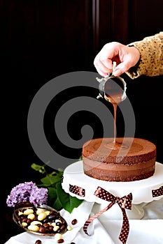 Covering cake with chocolate