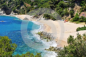 Coves of Cala Llorell beach in Tossa de Mar, Spain