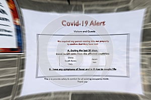 Covid-19 Alert Notice With Zoomed-In Blur