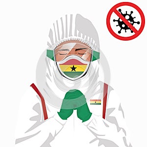 Covid-19 or Coronavirus concept. Ghanaian medical staff wearing mask in protective clothing and praying for against Covid-19 virus