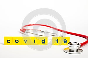 Covid-19 Coronavirus Concept - stethoscope, still object on white background, shallow depth of field