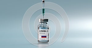 COVID-19 Coronavirus mRNA Vaccine and Syringe with flag of Russia on the label. Concept Image for SARS cov 2 infection pandemic
