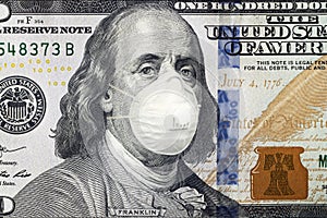 COVID-19 coronavirus in USA, 100 dollar money bill with N95 Face Mask. Coronavirus affects global stock market. World economy hit