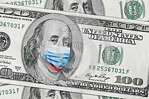 COVID-19 coronavirus in USA. Hundred golden dollar money bill with face mask.