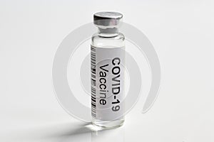 COVID-19 coronavirus vaccine on white background, bottle with vaccine for SARS-CoV-2 coronavirus cure