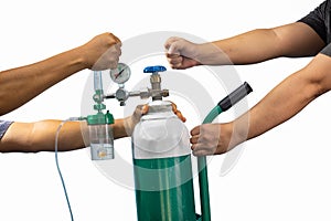 Covid-19 crisis, oxygen shortage cylinder. the man scramble Oxygen tank