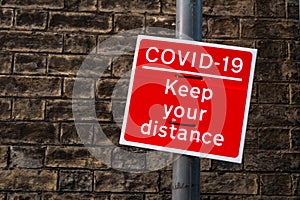 Covid-19 keep apart red sign to encourage social distancing, Cambridge