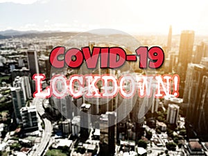 COVID-19 Lockdown inscription with city background.