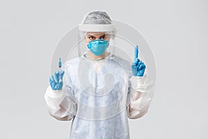 Covid-19, medical research, diagnosis, healthcare workers and quarantine concept. Determined doctor in PPE costume