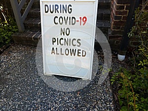 During covid 19 no picnics allowed sign on rocks