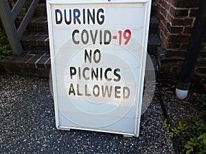 During covid 19 no picnics allowed sign on rocks