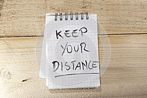 Covid-19 notes: keep your distance - on right