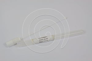 COVID-19 Omicron Nasopharyngeal probe container closeup view with white background
