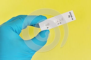 COVID-19 positive test by COVID-19 antigen test kit