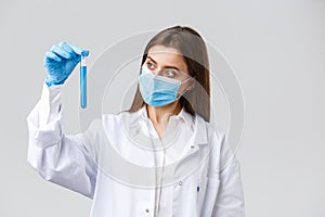 Covid-19, preventing virus, healthcare workers and quarantine concept. Tech lab clinic employee in personal protective