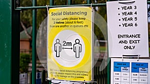 Covid-19 UK school social distancing advice sign with year groups