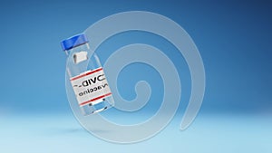 Covid 19 Vaccine Bottle Spinning on Studio Blue Background
