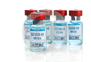 Covid 19 vaccine. Medical ampoules and syringe