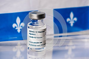Covid-19 vaccine and Quebec flag