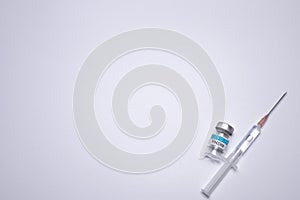 COVID-19 Vaccine on the white background. Healthcare and medical concept. Free space for text.