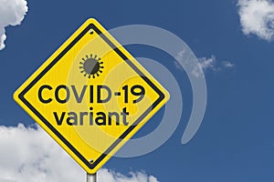 COVID-19 variant warning on a on yellow highway caution road sign