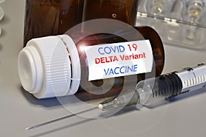 Covid-19 Delta variant strain vaccine. Syringe and vaccine. Treatment for coronavirus covid-19