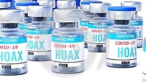 Covid hoax - vaccine bottles with an English label Hoax that symbolize a big human achievement that may end the fight with the