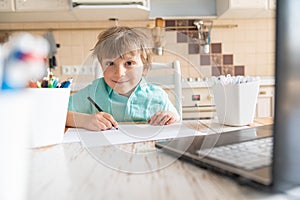 Covid lockdown - boy learns to draw online during self-isolation