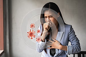 COVID-19 Pandemic Coronavirus, Asian woman have a cold and symptoms coughing, fever photo