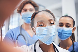 Covid, selfie and medical healthcare team happy about teamwork in a hospital or clinic. Portrait of a black woman doctor