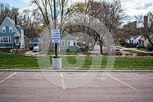 COVID vaccination site with sign and empty parking