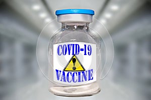 COVID-19 vaccine precautions, fake; hospital background photo
