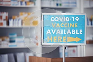 Covid vaccine sign, point and pharmacy notification for medicine protection, support or medical healthcare. Direction