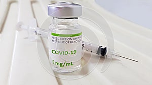 Covid-19 vaccine sterile vials with syringe